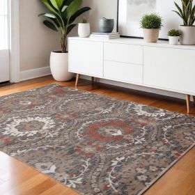 4' X 6' Rust Floral Stain Resistant Area Rug