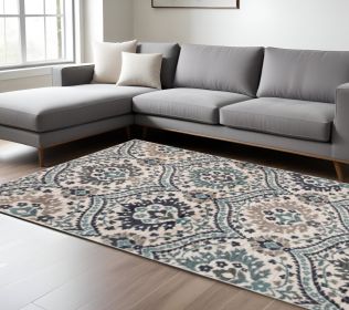 7' X 9' Ivory Blue And Gray Floral Stain Resistant Area Rug