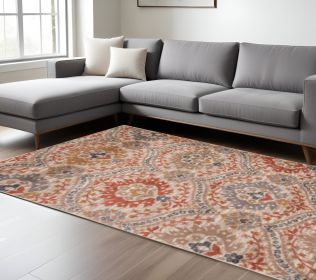8' X 10' Ivory Orange And Gray Floral Stain Resistant Area Rug
