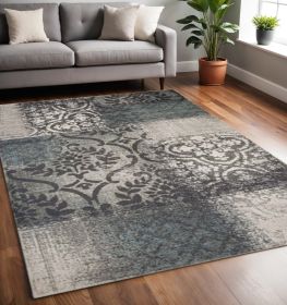 5' X 8' Teal And Gray Damask Distressed Stain Resistant Area Rug