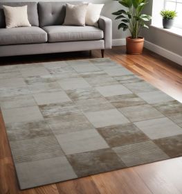 5' X 8' Beige Geometric Hand Woven Stain Resistant Area Rug