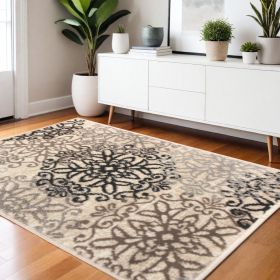 4' X 6' Tan Gray And Black Floral Medallion Stain Resistant Area Rug