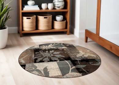 5' Beige And Black Round Floral Power Loom Distressed Area Rug