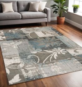 5' X 8' Teal Gray And Tan Floral Power Loom Distressed Stain Resistant Area Rug