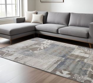 8' X 10' Gray and Ivory Floral Power Loom Distressed Area Rug