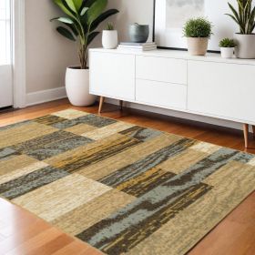 4' X 6' Light Blue And Beige Patchwork Power Loom Stain Resistant Area Rug