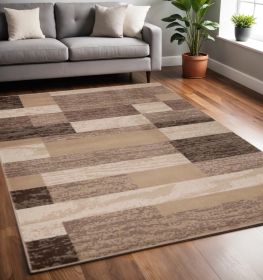 5' X 8' Beige Patchwork Power Loom Stain Resistant Area Rug