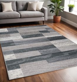 5' X 8' Blue And Taupe Patchwork Power Loom Stain Resistant Area Rug