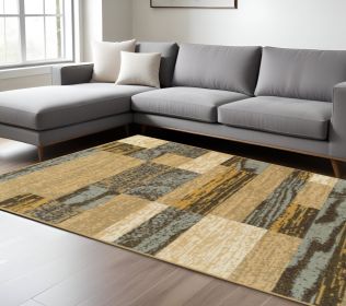 7' X 9' Light Blue And Beige Patchwork Power Loom Stain Resistant Area Rug