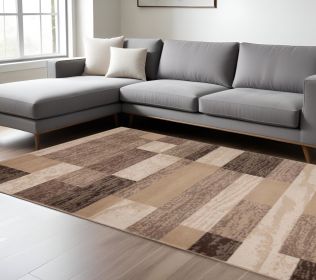 8' X 10' Beige Patchwork Power Loom Stain Resistant Area Rug