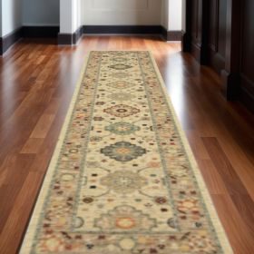 2' X 10' Beige And Ivory Oriental Power Loom Runner Rug With Fringe