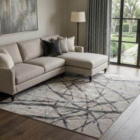 7' X 10' Taupe Gray And Ivory Abstract Stain Resistant Area Rug