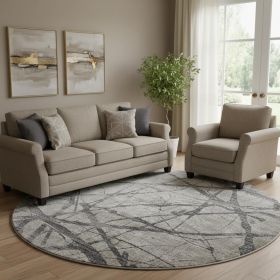9' Taupe Gray And Ivory Round Abstract Stain Resistant Area Rug