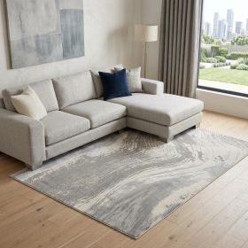 7' X 10' Gray Ivory And Blue Abstract Stain Resistant Area Rug