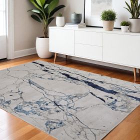 4' X 6' Ivory and Blue Marble Power Loom Distressed Area Rug